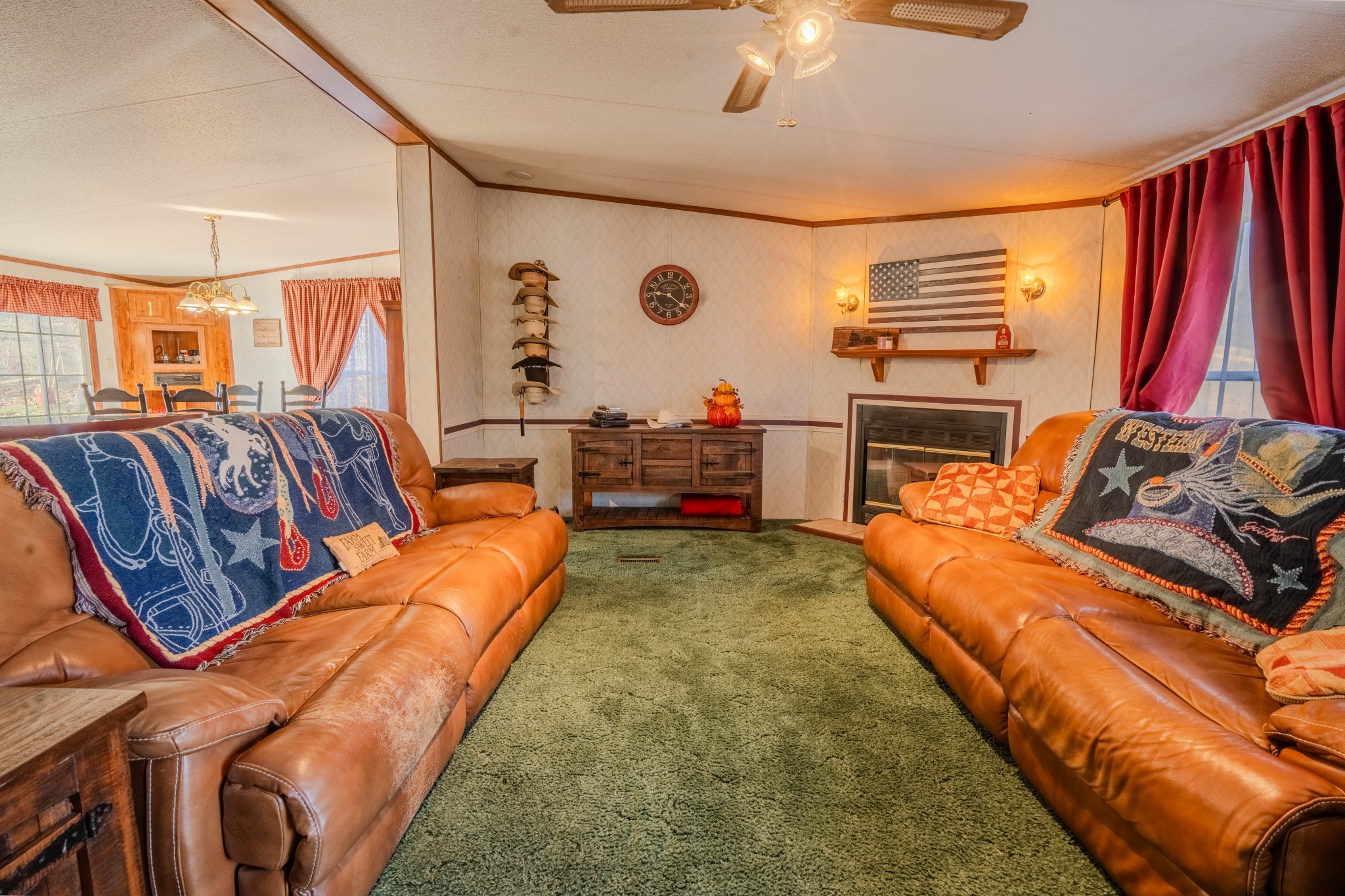 875 Waterloo Road Westpoint, TN 38486 - Photo 11 of 59 a living room with furniture and a flat screen tv