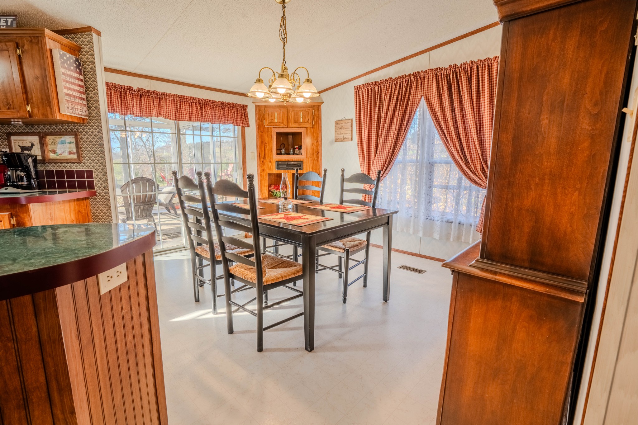 875 Waterloo Road Westpoint, TN 38486 - Photo 13 of 60 a dining room with furniture and chandelier kitchen view
