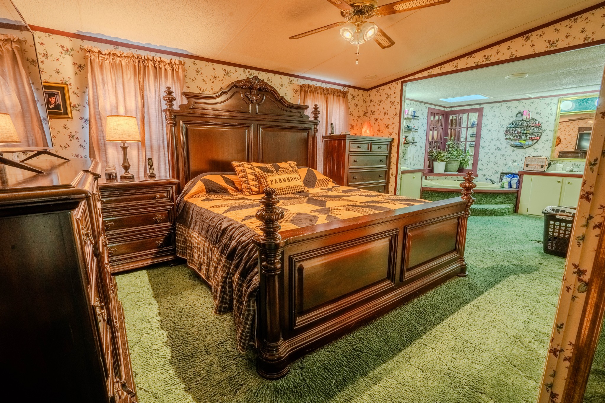 875 Waterloo Road Westpoint, TN 38486 - Photo 16 of 59 a bed sitting in a room next to a window