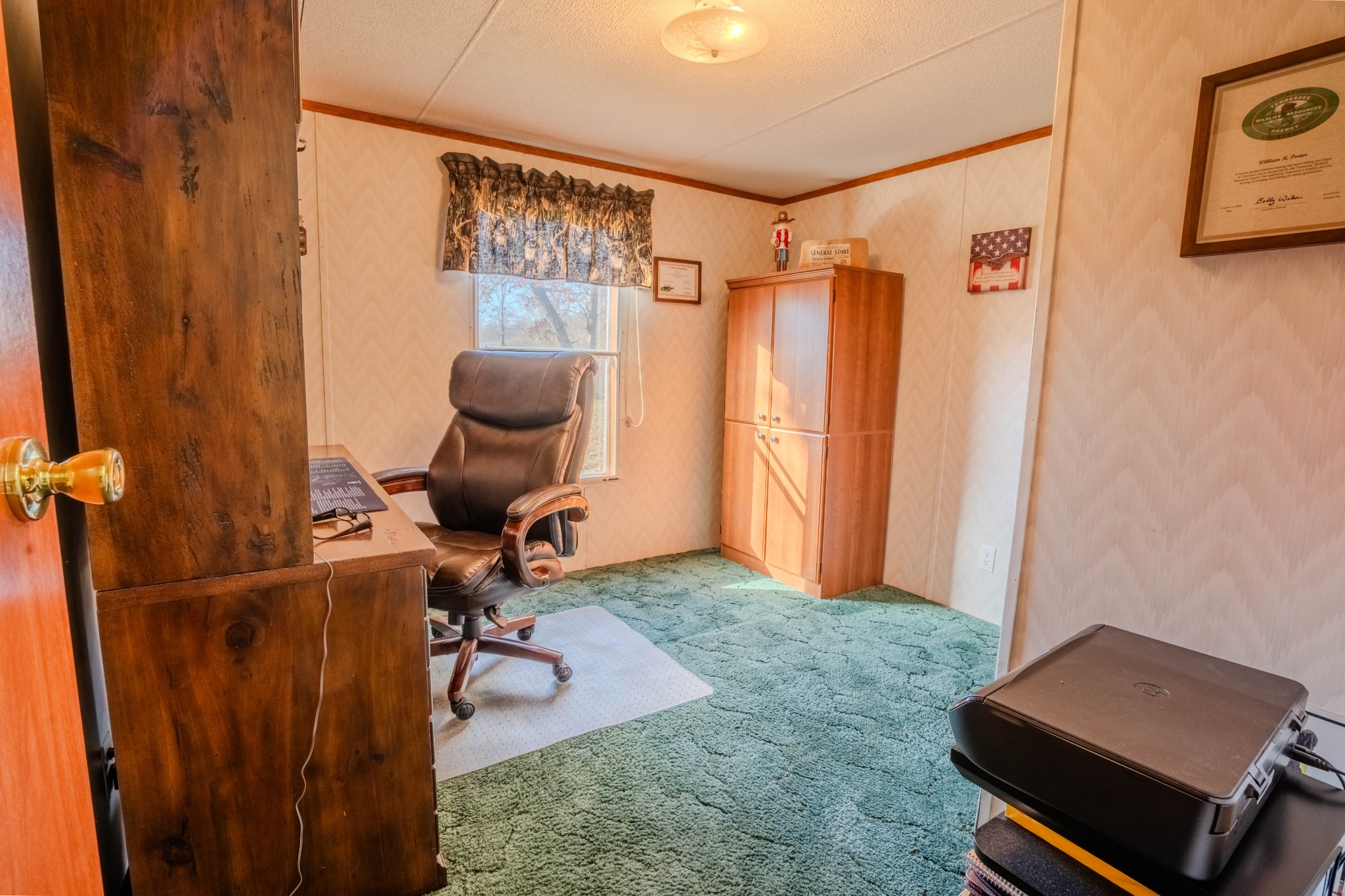 875 Waterloo Road Westpoint, TN 38486 - Photo 18 of 59 a room with furniture and a window