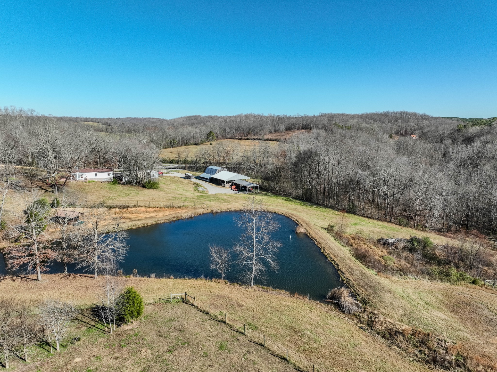 875 Waterloo Road Westpoint, TN 38486 - Photo 23 of 60 a view of a dry yard with wooden fence
