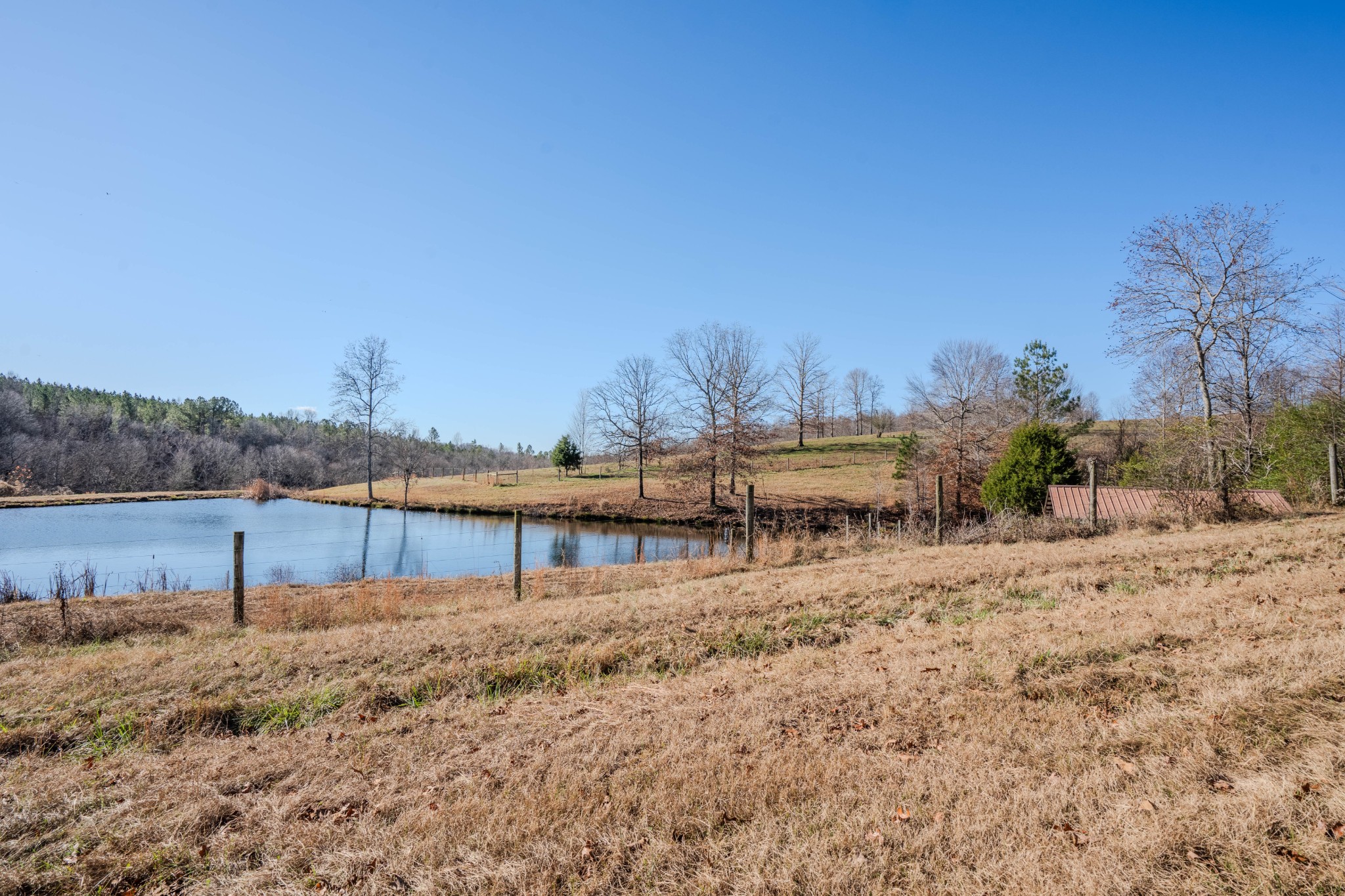 875 Waterloo Road Westpoint, TN 38486 - Photo 34 of 59 a view of a house with a yard and sitting area