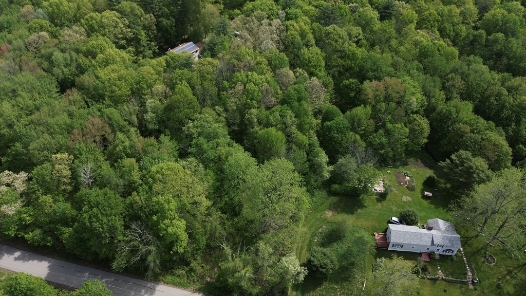 291 Wigwam Road West Brookfield, MA 01585 - Photo 4 of 7 an aerial view of a house with pool yard and outdoor seating