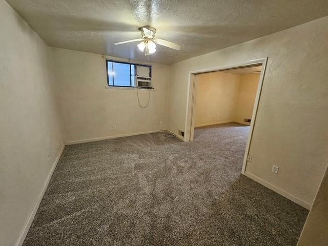 535 3rd Street Pitcairn, PA 15140 - Photo 9 of 13 an empty room with windows and fan