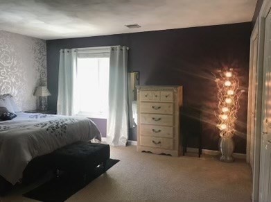 330 Sunderland Road, Unit 78 Worcester, MA 01604 - Photo 12 of 27 a bedroom with a bed and a closet