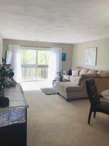 330 Sunderland Road, Unit 78 Worcester, MA 01604 - Photo 13 of 27 a living room with furniture and a window