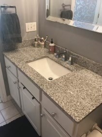 330 Sunderland Road, Unit 78 Worcester, MA 01604 - Photo 14 of 27 a bathroom with a granite countertop sink and a mirror