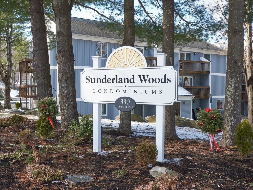 330 Sunderland Road, Unit 78 Worcester, MA 01604 - Photo 2 of 27 a sign on the side of a road