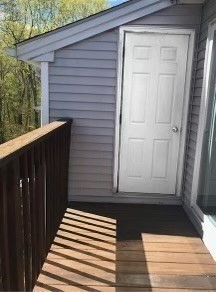 330 Sunderland Road, Unit 78 Worcester, MA 01604 - Photo 23 of 27 a view of a door and wooden floor