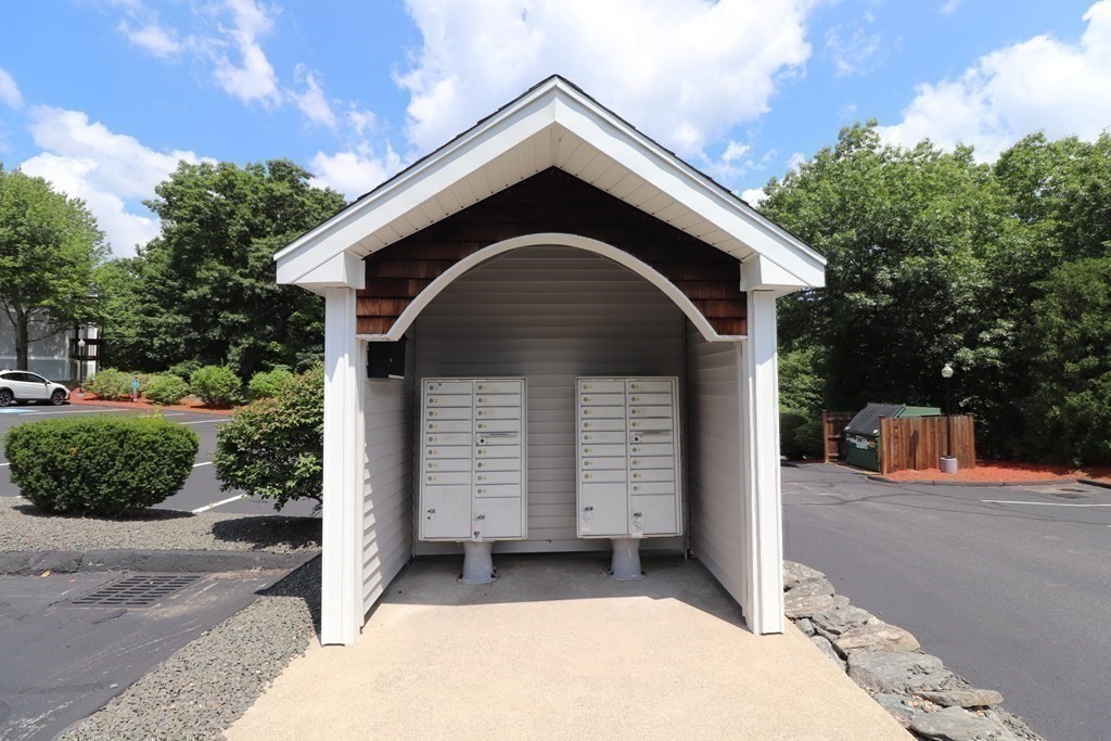 330 Sunderland Road, Unit 78 Worcester, MA 01604 - Photo 26 of 27 a front view of a house with a garage