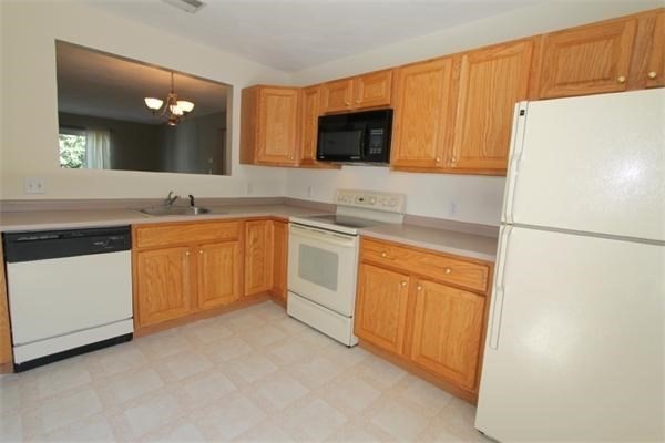 330 Sunderland Road, Unit 78 Worcester, MA 01604 - Photo 4 of 27 a kitchen with a sink stove and refrigerator