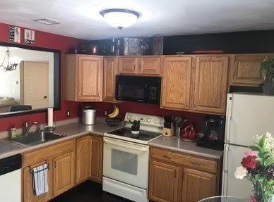 330 Sunderland Road, Unit 78 Worcester, MA 01604 - Photo 5 of 27 a kitchen with granite countertop a sink cabinets and stainless steel appliances