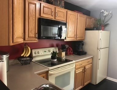 330 Sunderland Road, Unit 78 Worcester, MA 01604 - Photo 6 of 27 a kitchen with a refrigerator sink and cabinets