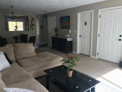 330 Sunderland Road, Unit 78 Worcester, MA 01604 - Photo 9 of 27 a living room with furniture and a potted plant
