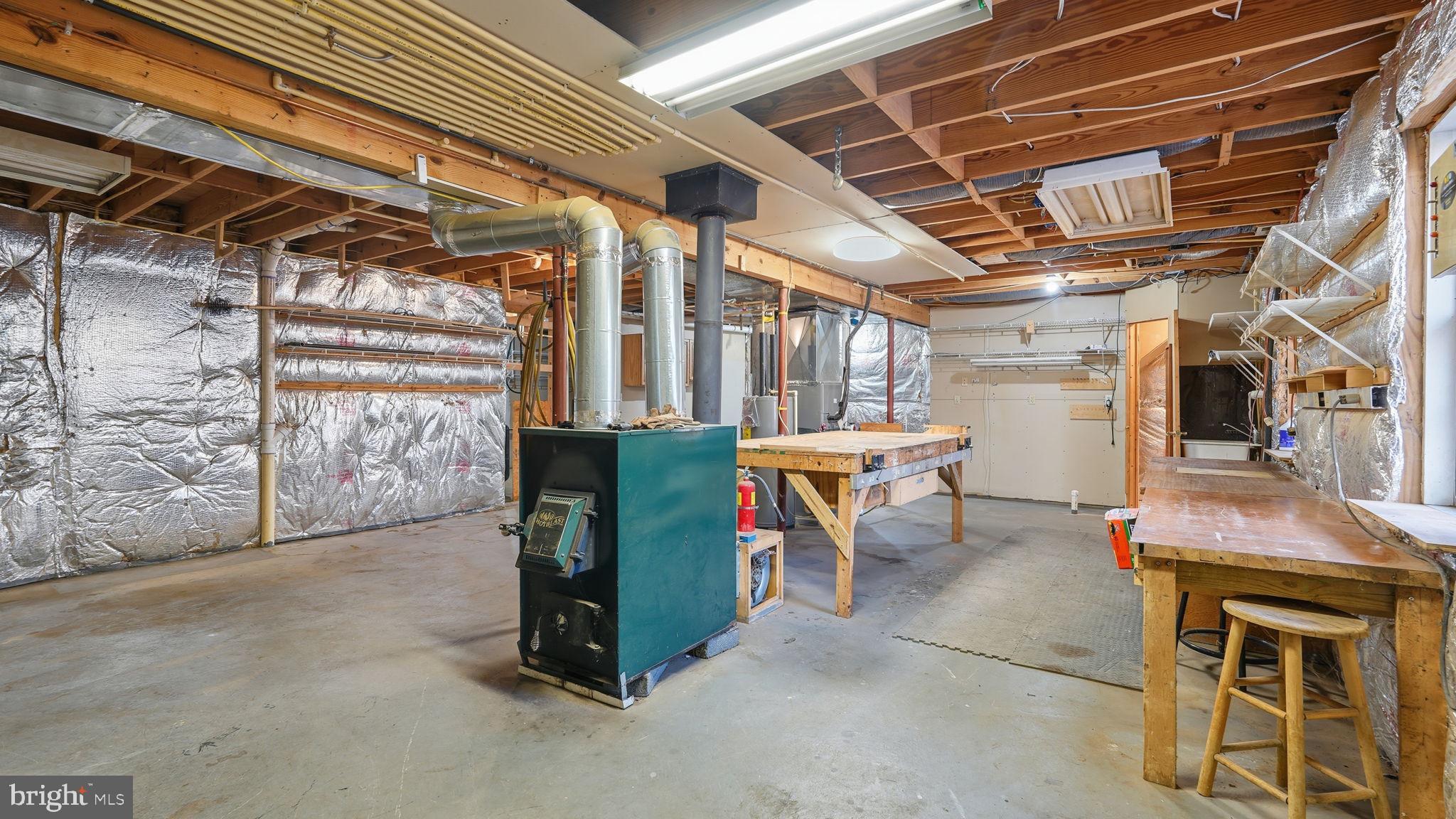 14630 North Rapidan Road Fredericksburg, VA 22407 - Photo 29 of 35 WOOD FURNACE FOR BACK UP OR EVERYDAY USE