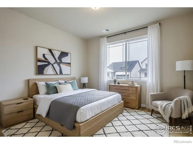 a view of an empty room with closet