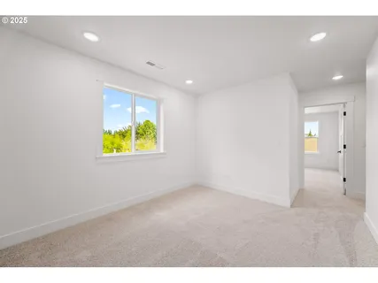 a kitchen with a sink cabinets and appliances
