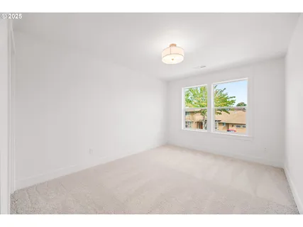 a view of room with racks on the wall