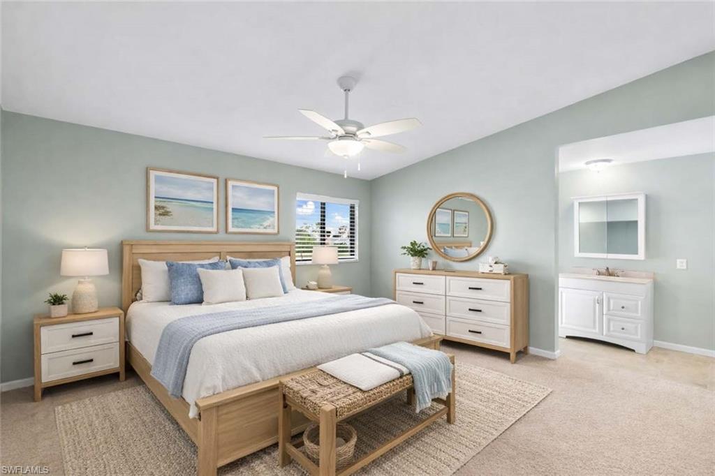17017 Golfside Circle, Unit 404 Fort Myers, FL 33908 - Photo 11 of 22 a bedroom with a bed and a dresser