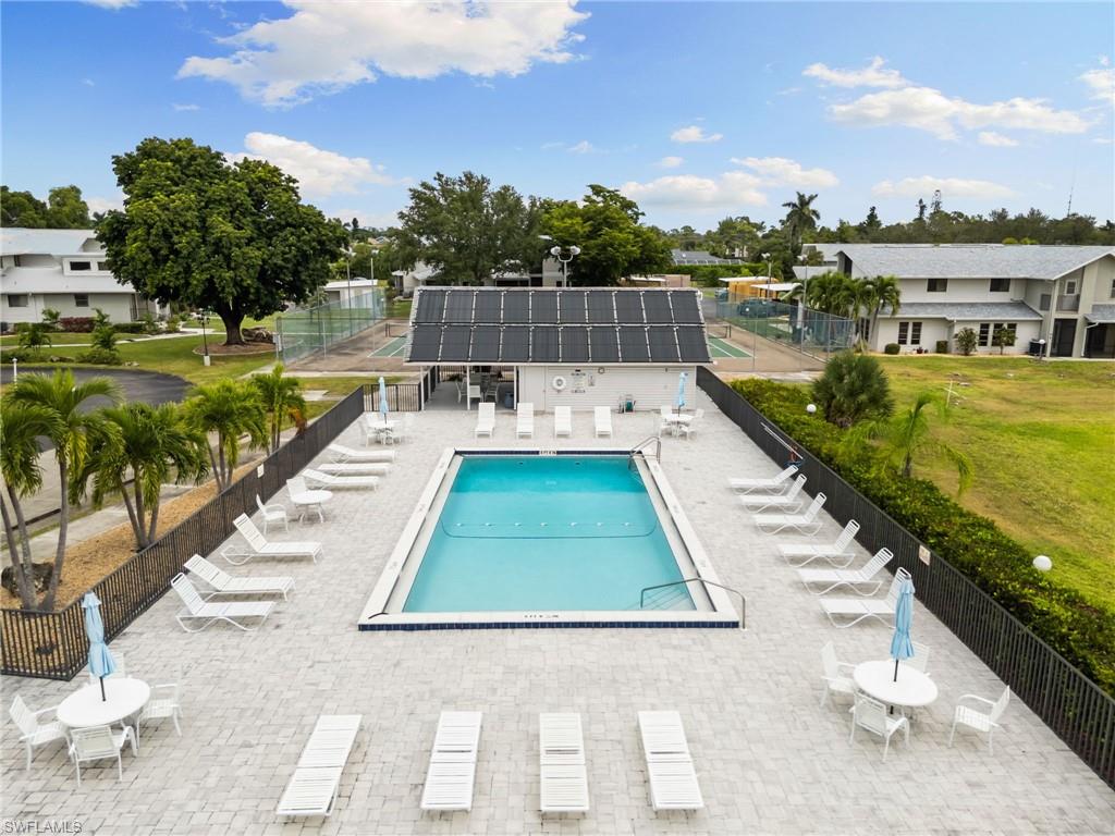 17017 Golfside Circle, Unit 404 Fort Myers, FL 33908 - Photo 20 of 22 a view of swimming pool with lounge chair