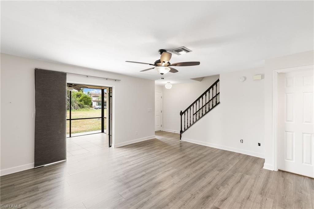 17017 Golfside Circle, Unit 404 Fort Myers, FL 33908 - Photo 5 of 22 a view of an entryway with wooden floor