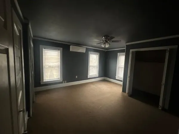 a view of a livingroom with a fireplace