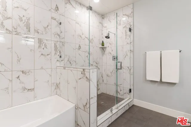 a bedroom with a bed and a cabinets