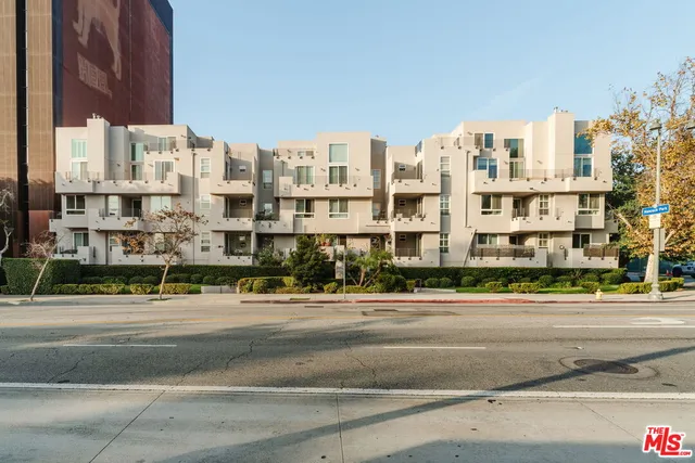 a street sign on a pole on a street