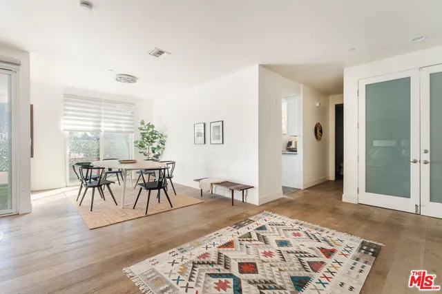 a bathroom with a toilet a sink and a shower