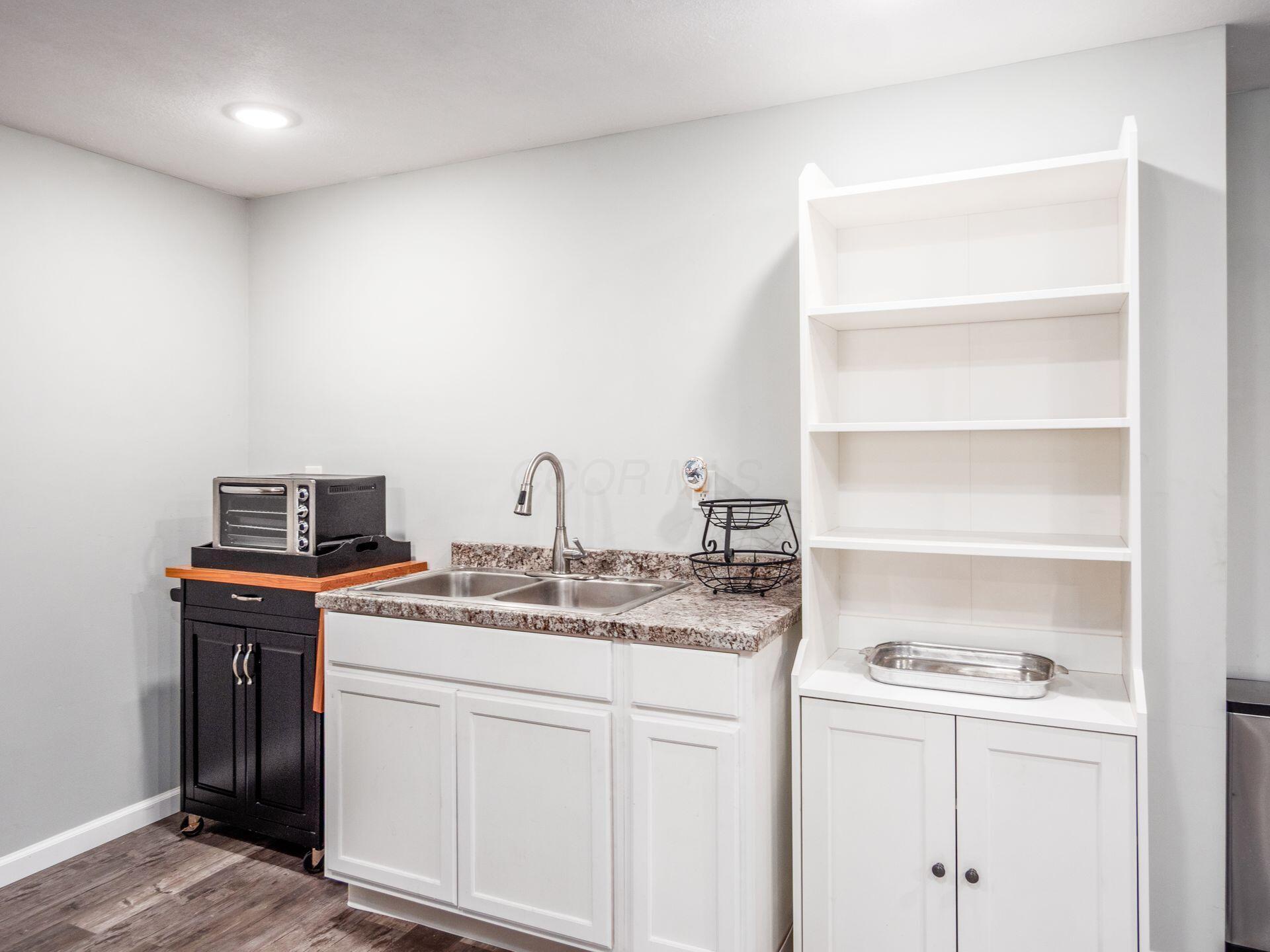 4550 Lilly Chapel Opossum Run Road London, OH 43140 - Photo 44 of 60 Lower level kitchenette