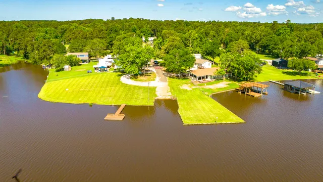 a view of a swimming pool with a lounge chairs