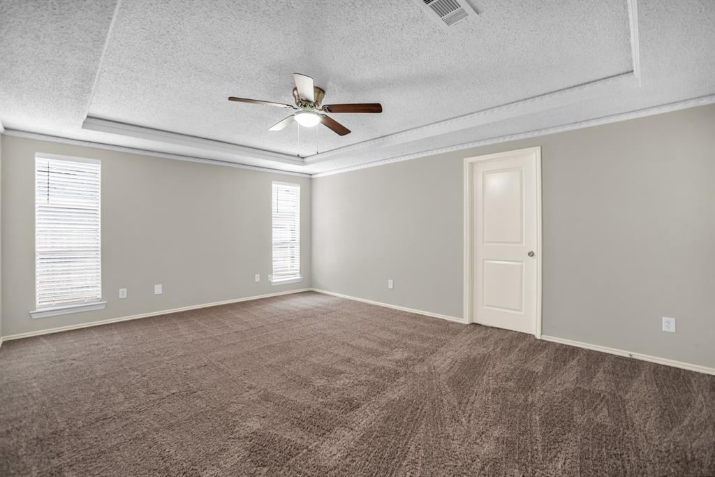 5902 Fawn Valley Lane Rowlett, TX 75089 - Photo 19 of 27 a view of an empty room with a window