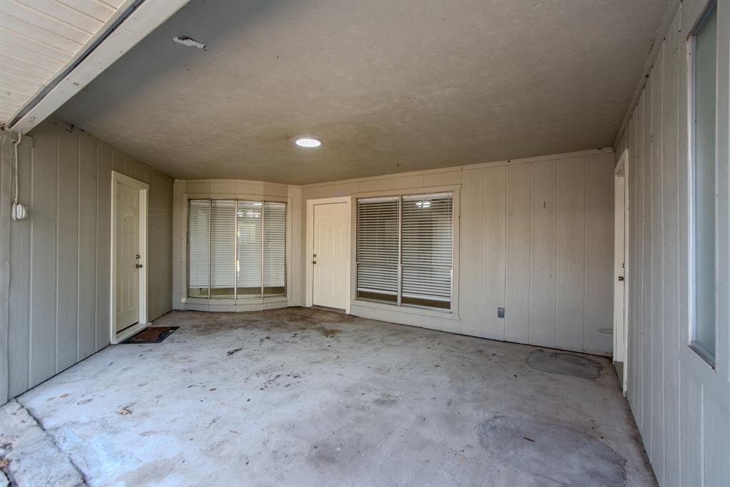 5902 Fawn Valley Lane Rowlett, TX 75089 - Photo 26 of 27 an empty room with windows