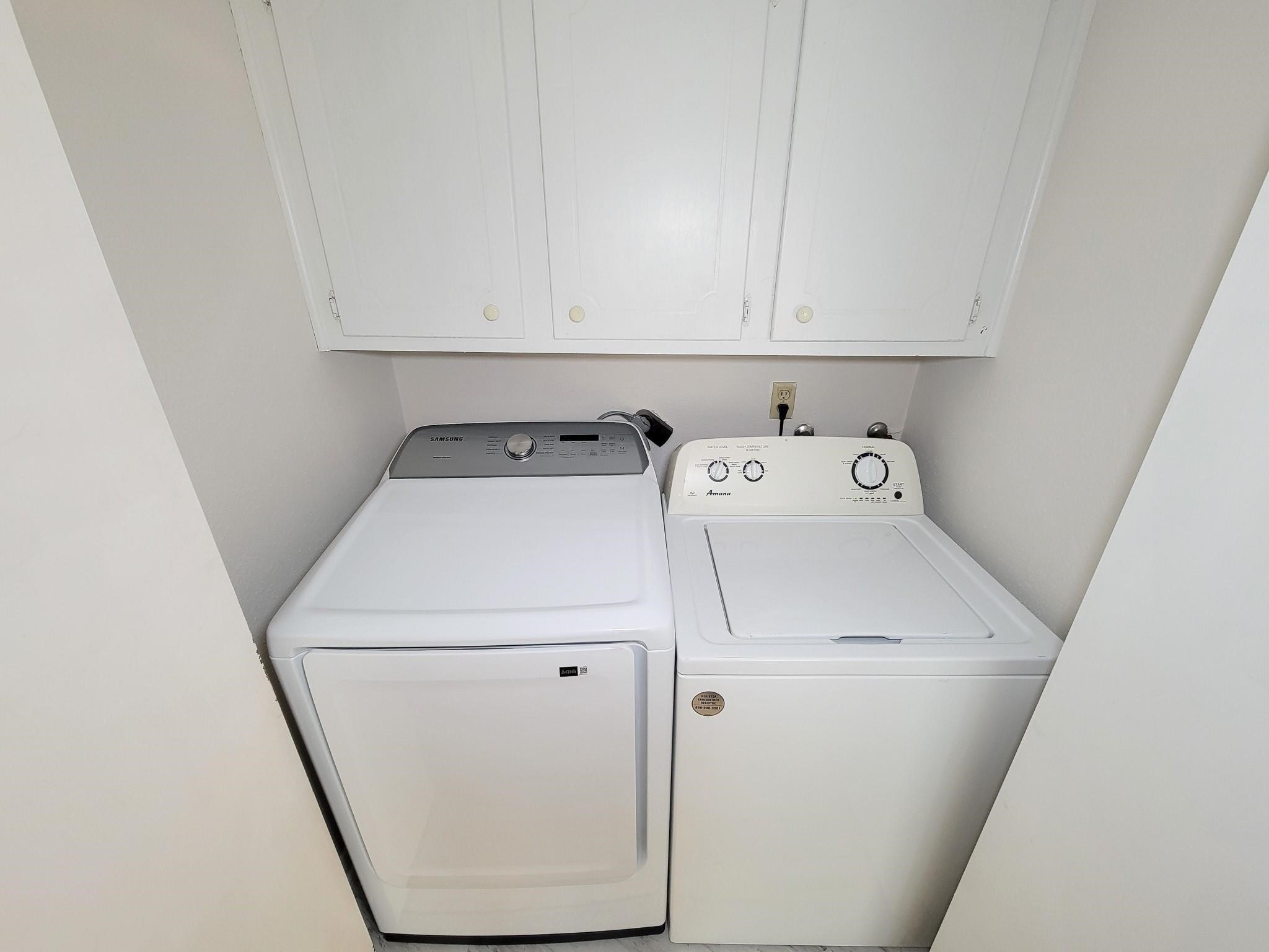 1815 Country Village Boulevard Humble, TX 77338 - Photo 21 of 34 a utility room with dryer and washer