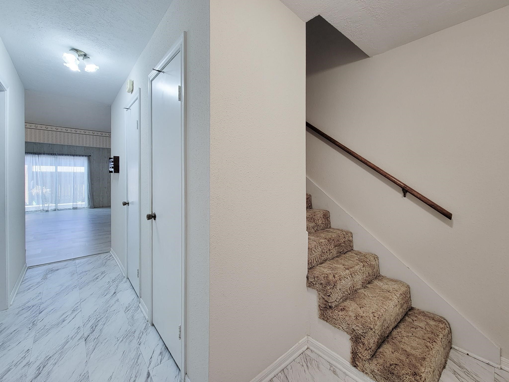 1815 Country Village Boulevard Humble, TX 77338 - Photo 22 of 34 a view of entryway and hall with wooden floor