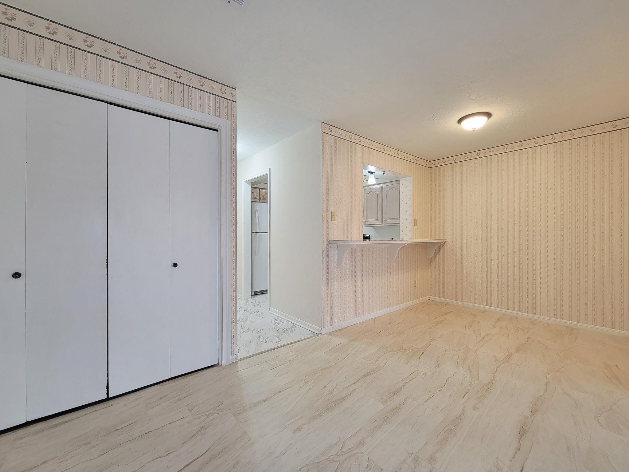 1815 Country Village Boulevard Humble, TX 77338 - Photo 23 of 34 a view of an empty room and wooden floor