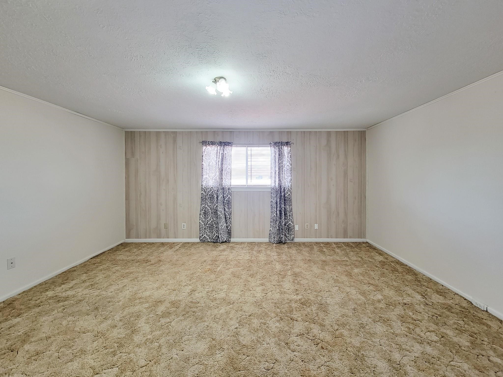 1815 Country Village Boulevard Humble, TX 77338 - Photo 4 of 34 a view of an empty room with windows