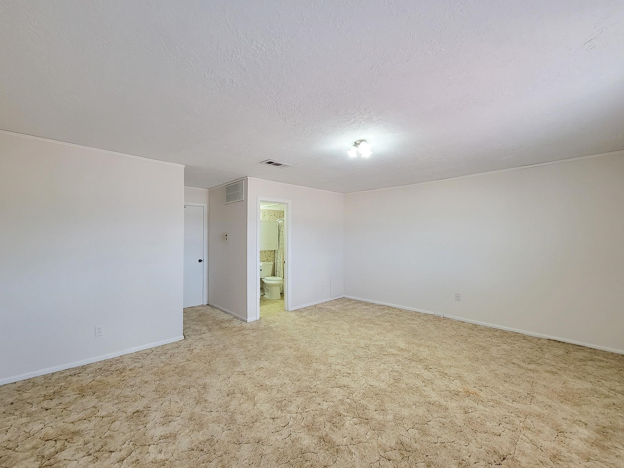 1815 Country Village Boulevard Humble, TX 77338 - Photo 5 of 34 an empty room with an entryway
