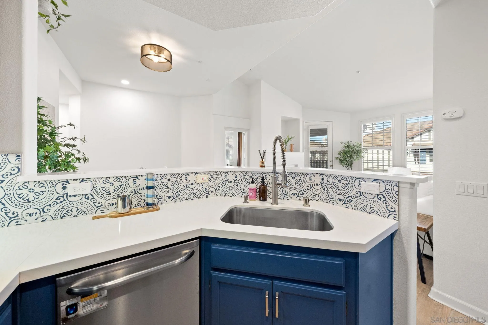 549 Sweet Pea Place Encinitas, CA 92024 - Photo 12 of 29 a bathroom with a sink and a mirror
