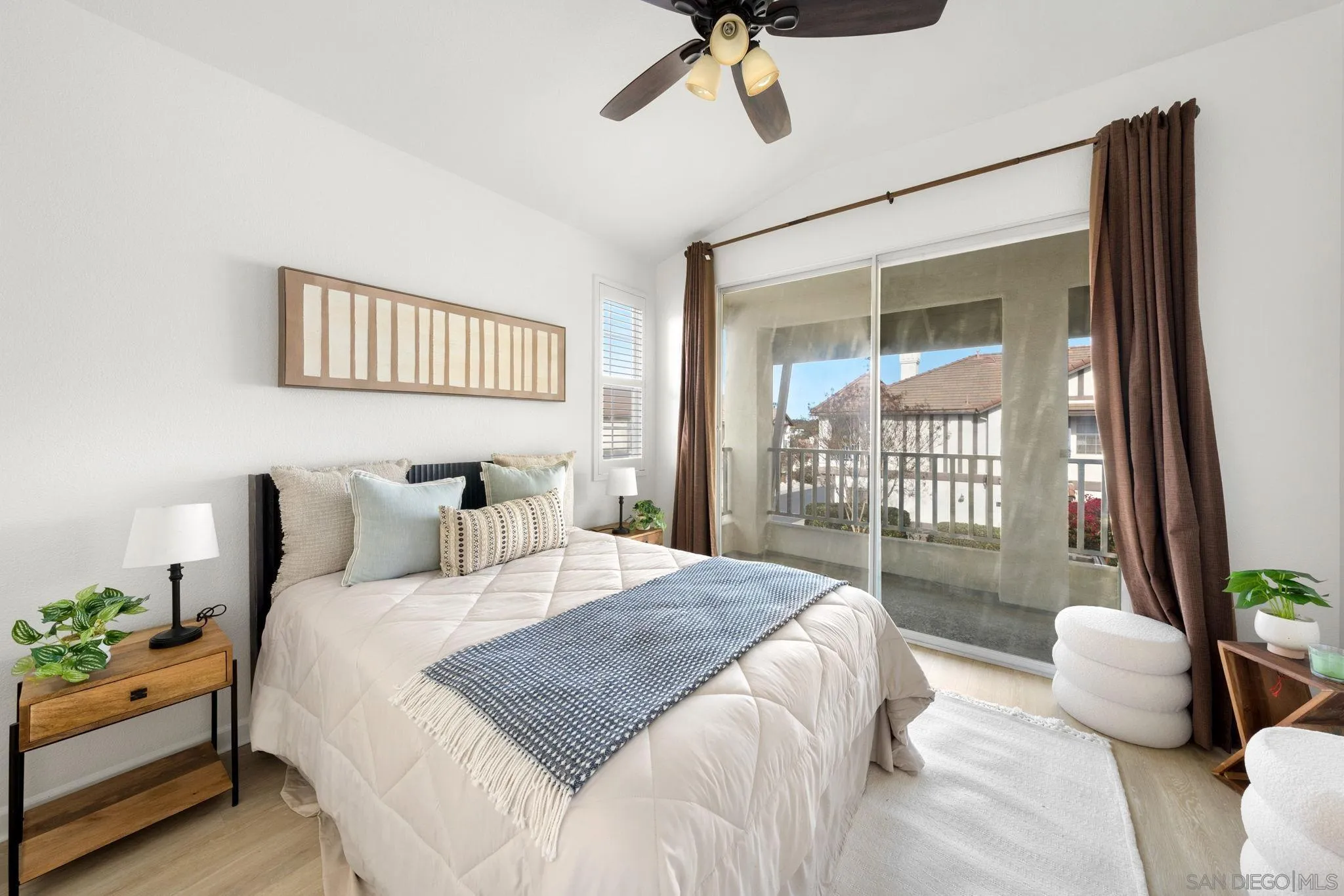 549 Sweet Pea Place Encinitas, CA 92024 - Photo 14 of 29 a bedroom with a bed and a window