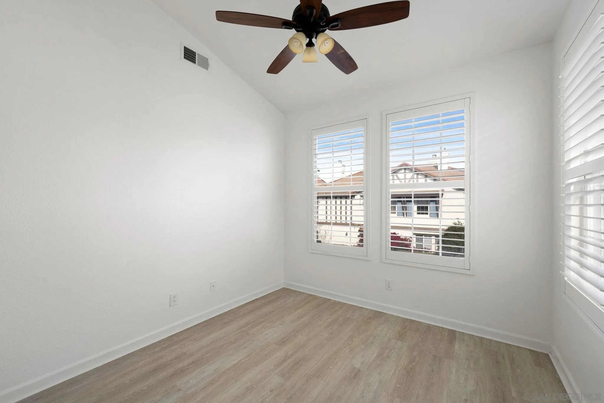 549 Sweet Pea Place Encinitas, CA 92024 - Photo 19 of 29 a view of an empty room with a window