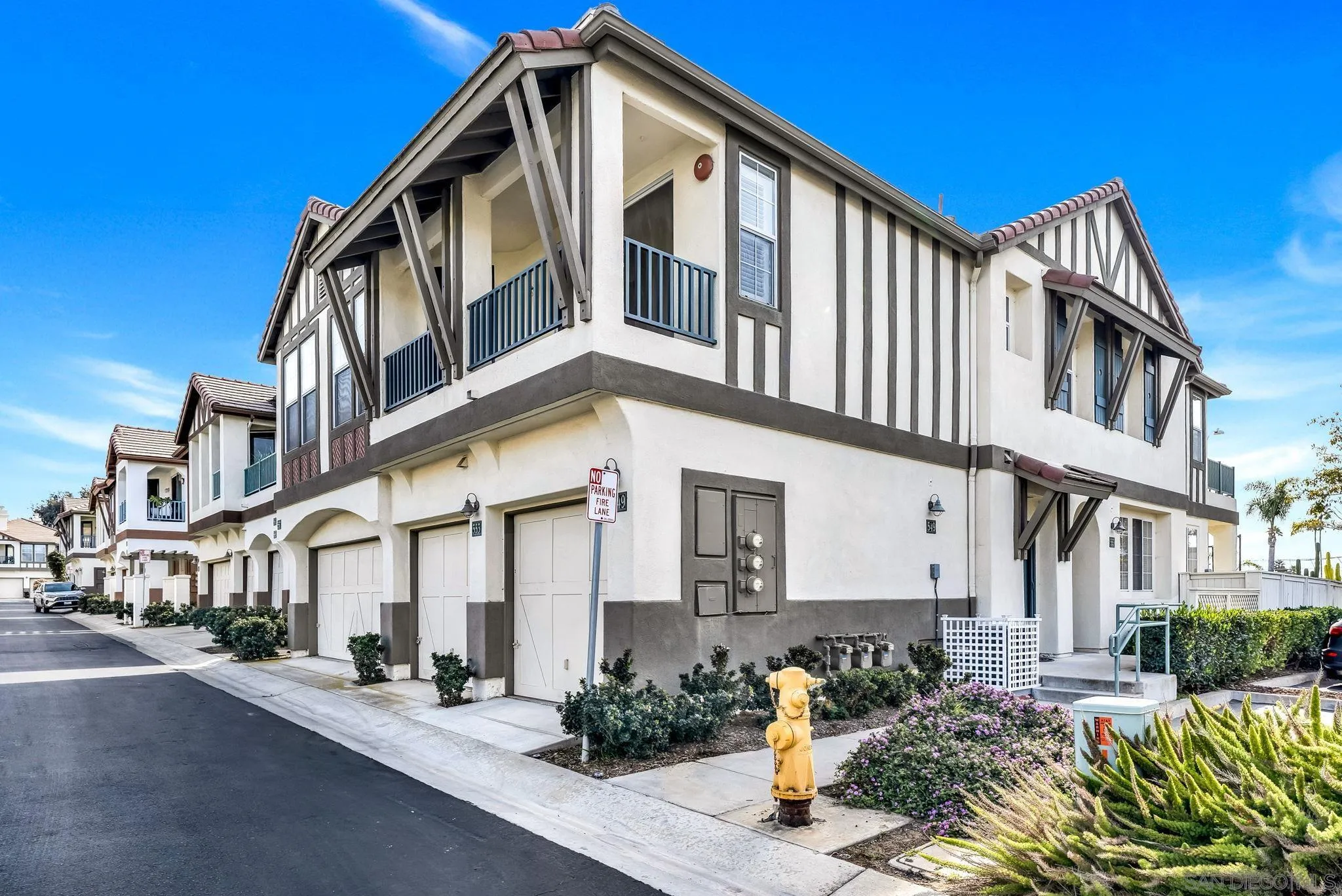 549 Sweet Pea Place Encinitas, CA 92024 - Photo 2 of 29 a front view of a house with a yard