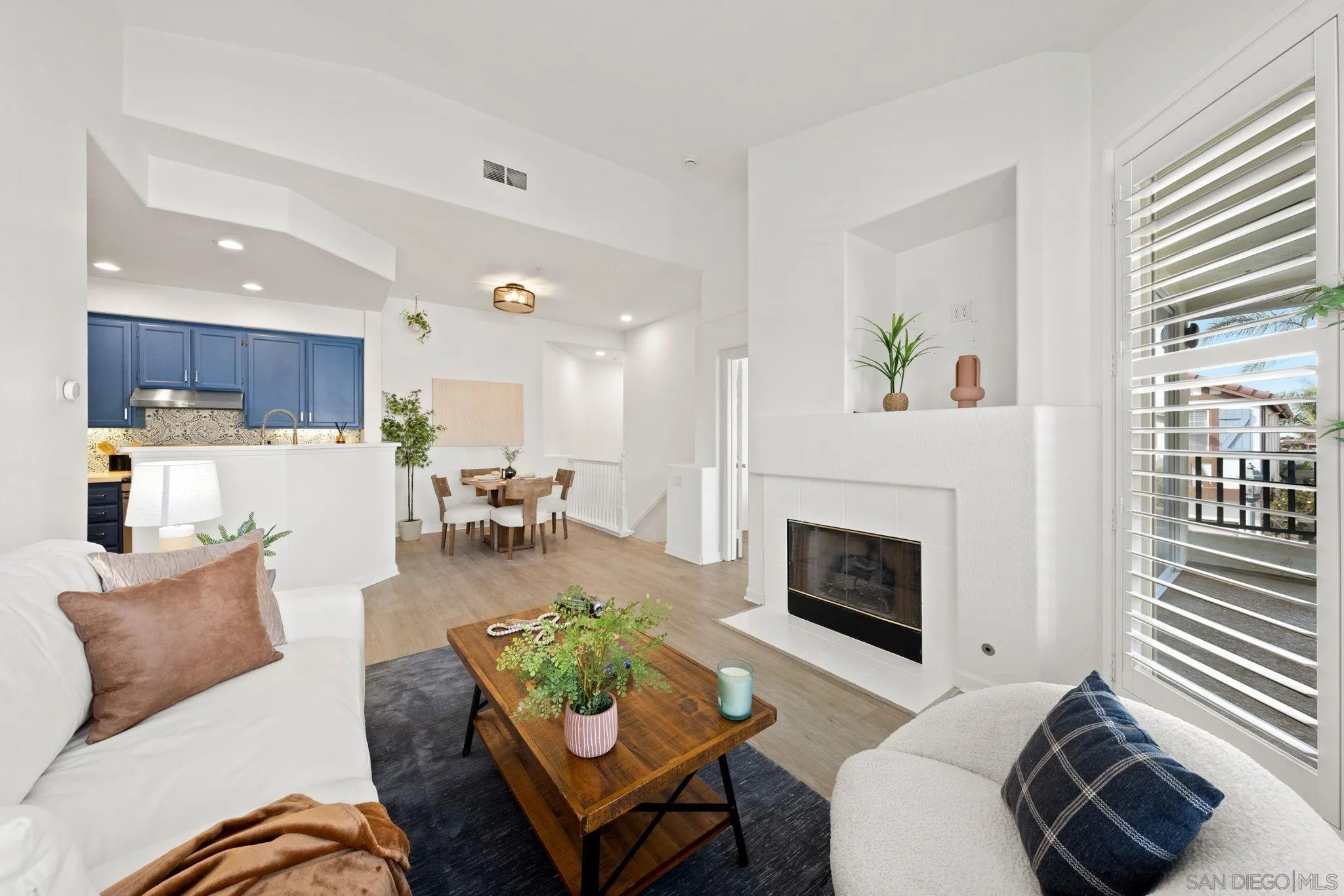 549 Sweet Pea Place Encinitas, CA 92024 - Photo 10 of 29 a living room with furniture and a fireplace