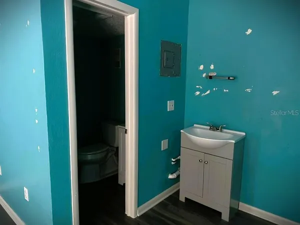 a bathroom with a sink and mirror