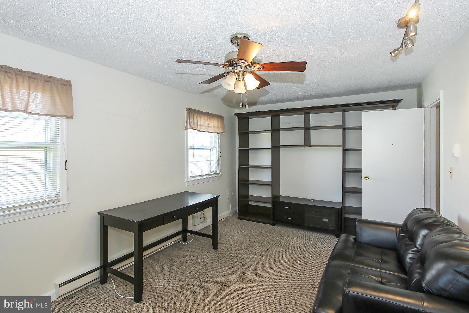 20820 Slidell Road Boyds, MD 20841 - Photo 21 of 29 a living room with furniture and a window