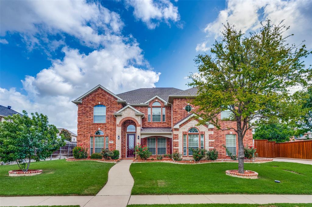 621 Avalanche Drive Murphy, TX 75094 - Photo 1 of 1 front view of a house with a yard