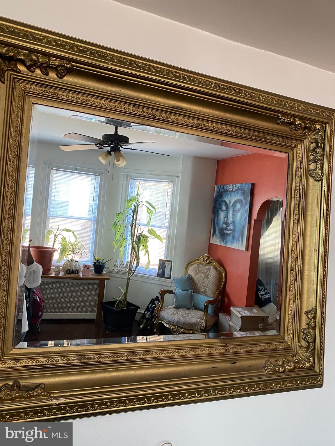 813 Levick Street Philadelphia, PA 19111 - Photo 12 of 43 a living room with furniture and a chandelier
