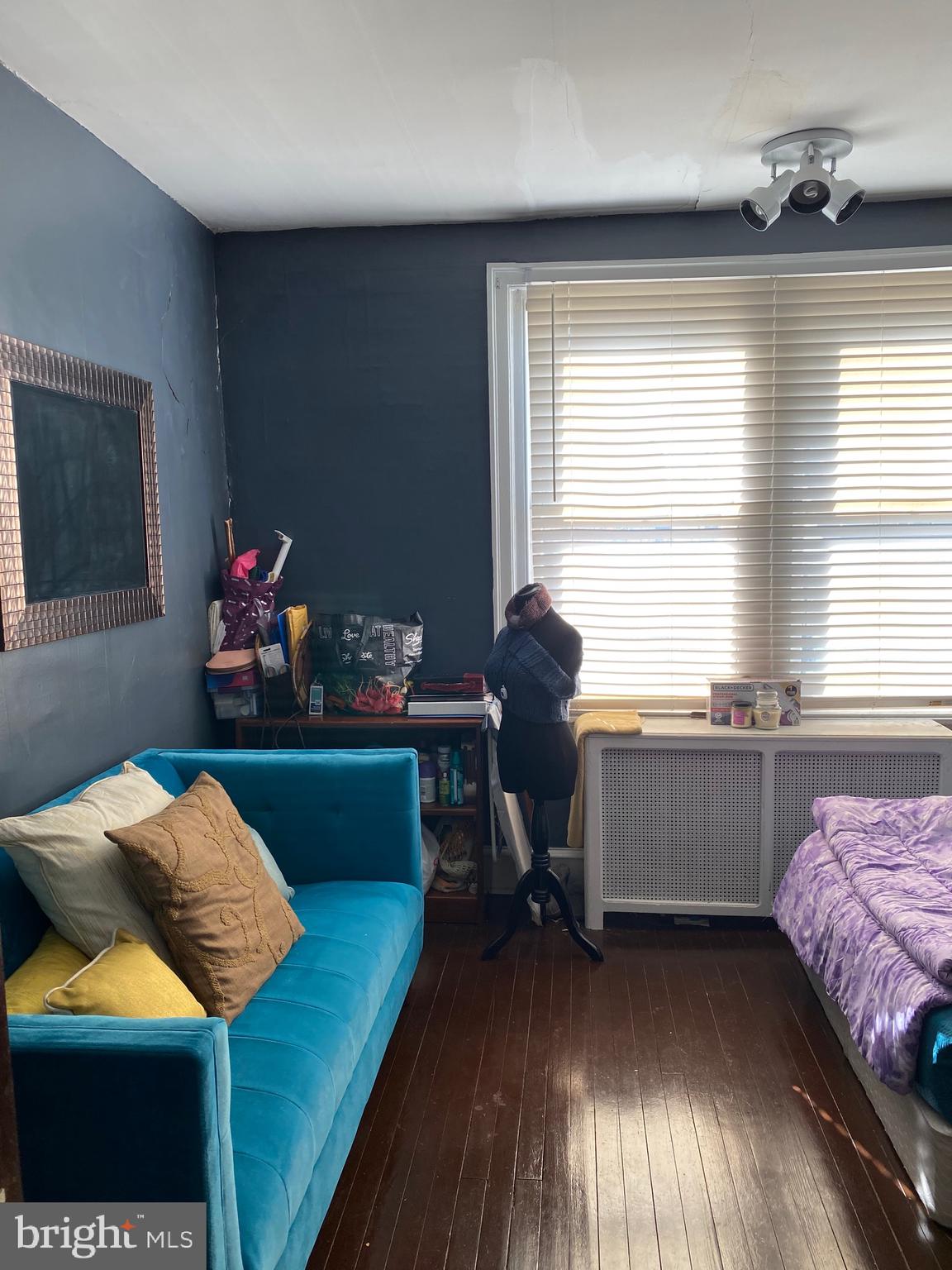 813 Levick Street Philadelphia, PA 19111 - Photo 27 of 43 a bedroom with furniture and a window