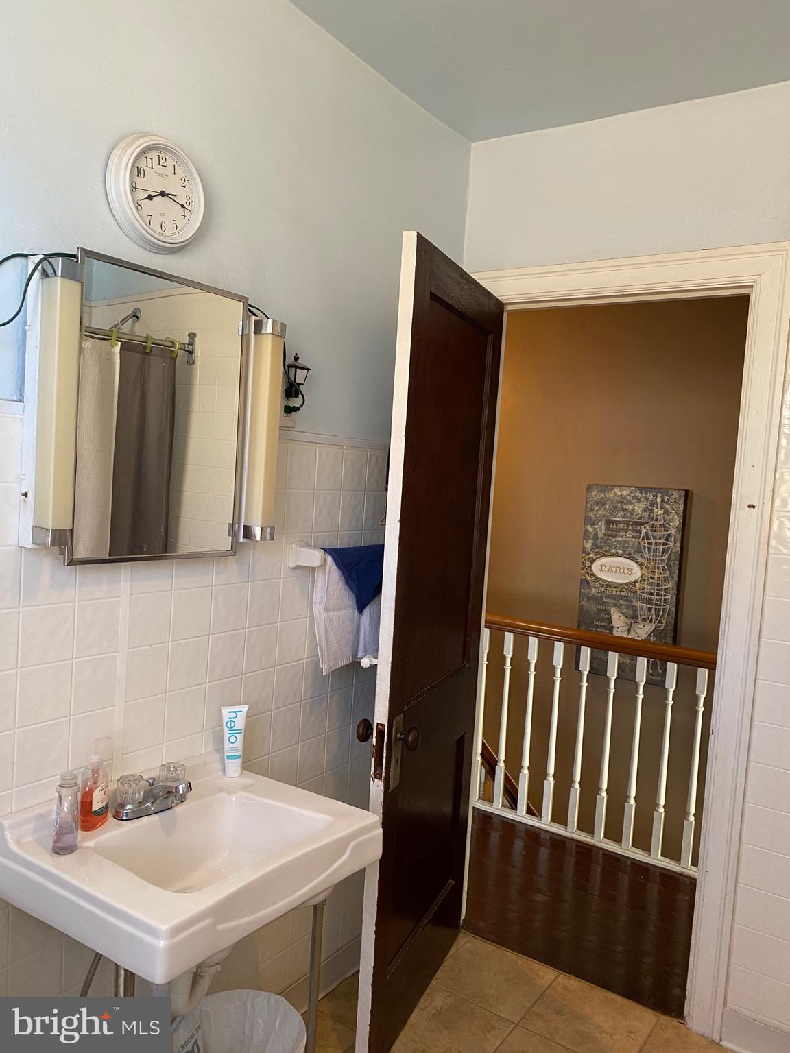 813 Levick Street Philadelphia, PA 19111 - Photo 33 of 43 a bathroom with a sink and a mirror