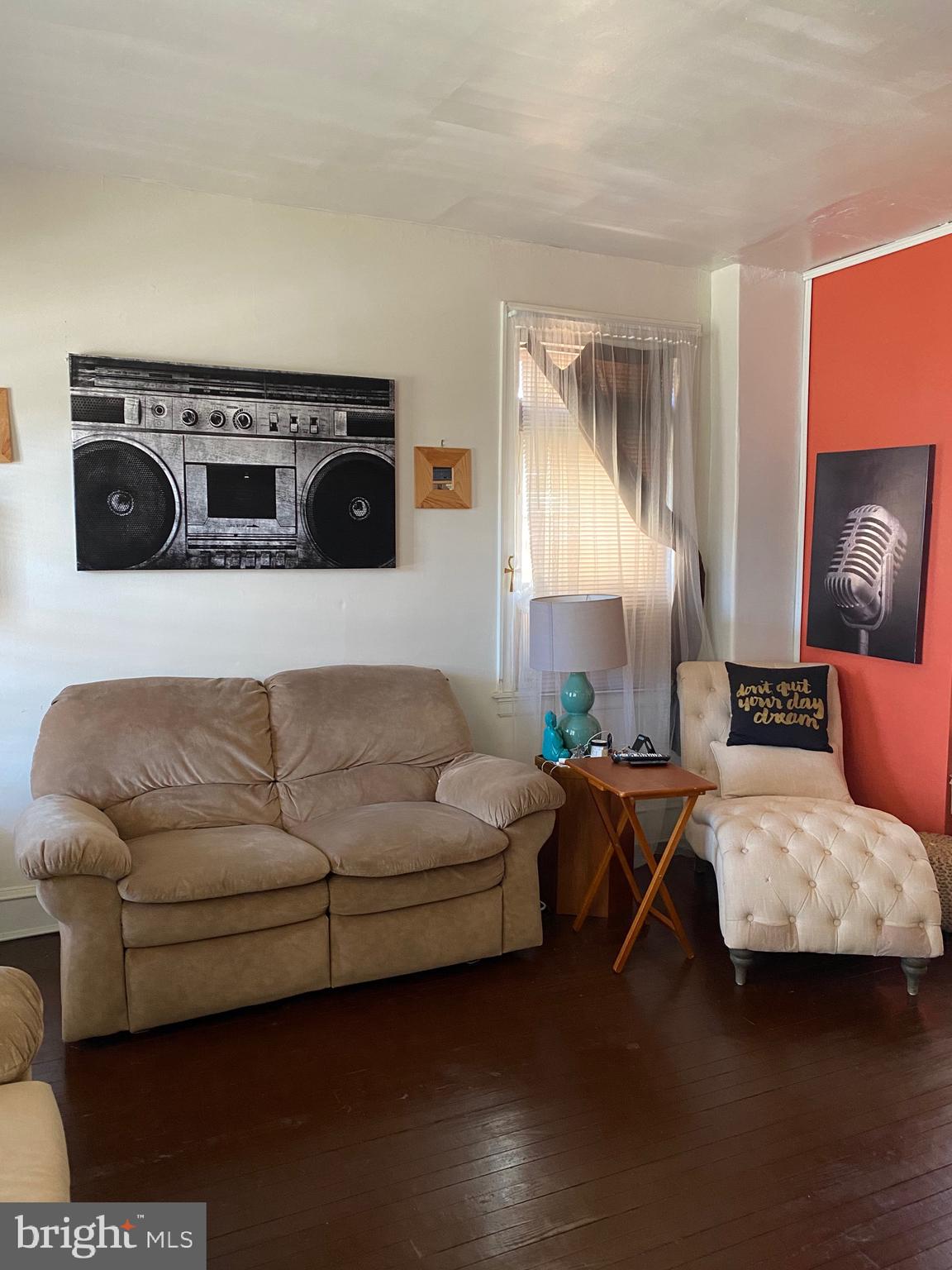 813 Levick Street Philadelphia, PA 19111 - Photo 5 of 43 a living room with furniture and painting on the wall